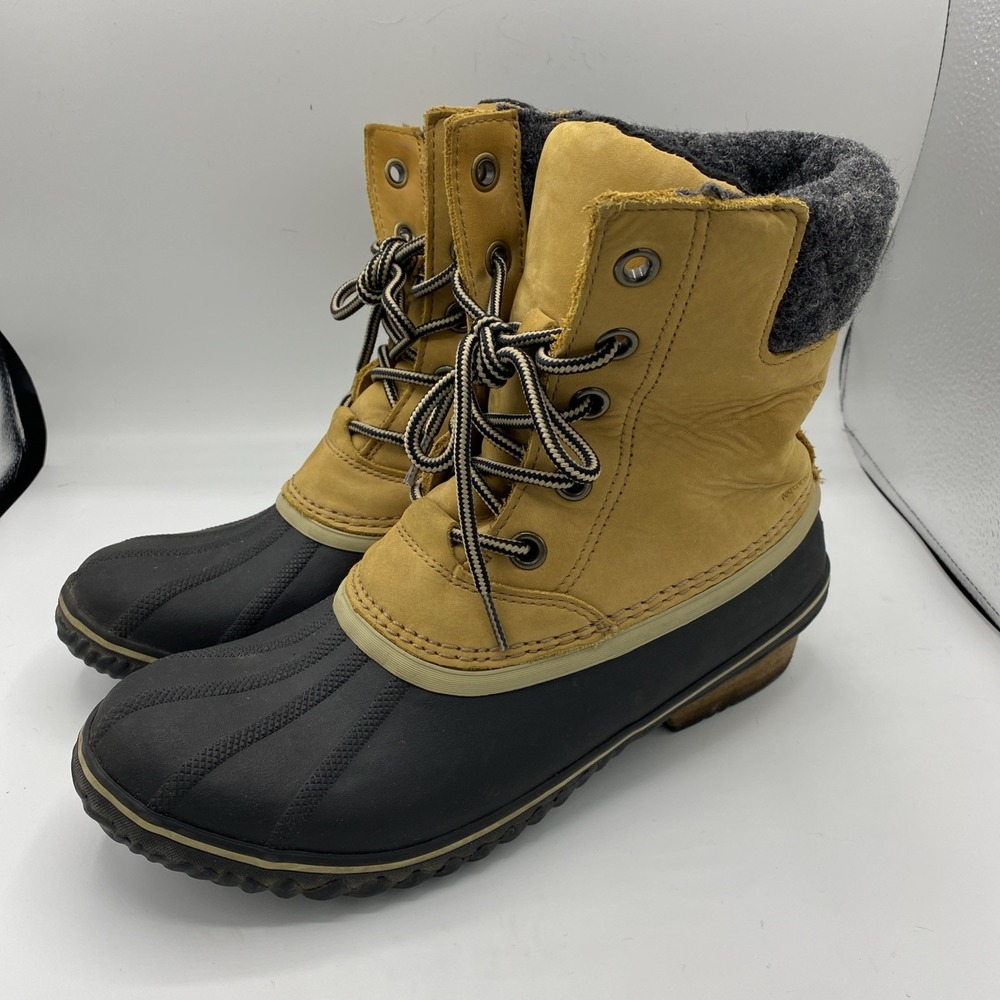 Sorel Tan and Black Winter Boots